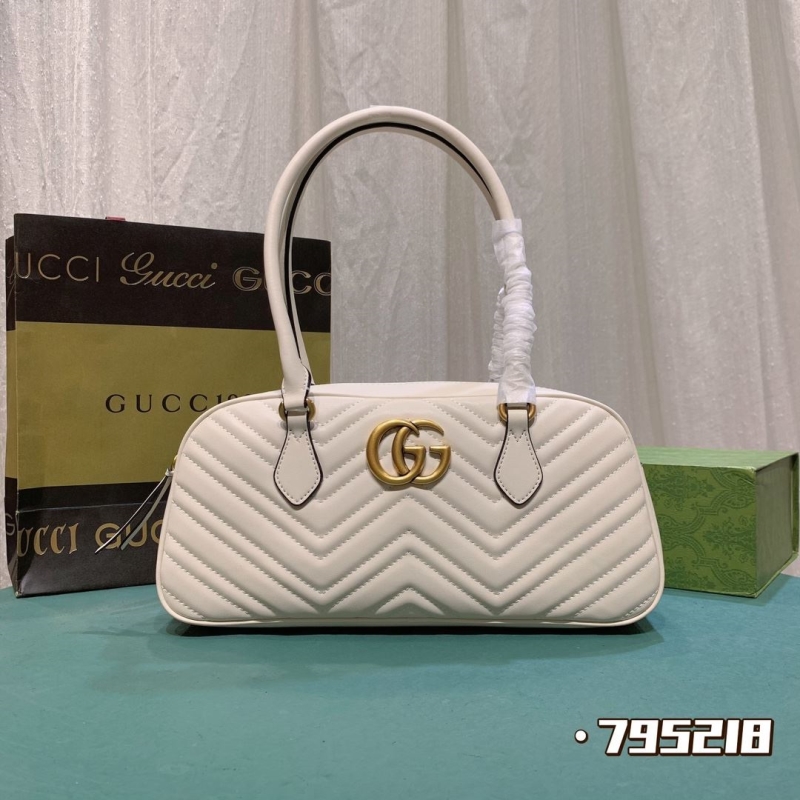 G*u*i top handle bags